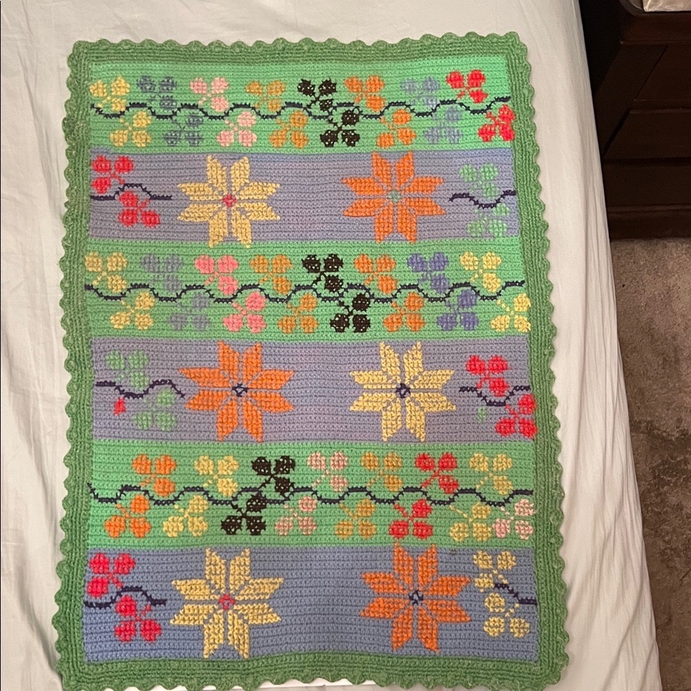 Colorful Crochet Tapestry with Floral Design